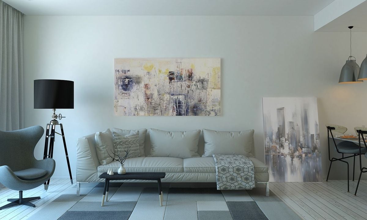 Sala de estar moderna e bem iluminada, ambiente típico para instalar um ar-condicionado